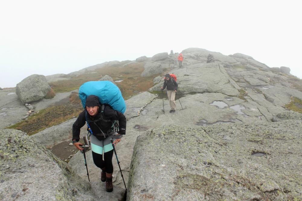 Summer on a High Peak summit can mean pants and windbreakers. Be prepared!