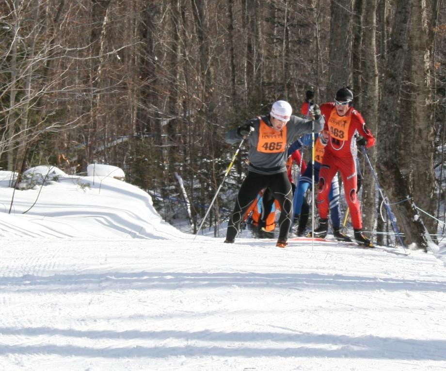A competitor attacks the final climb on the Porter Mountain Loops during the Lake Placid Loppet