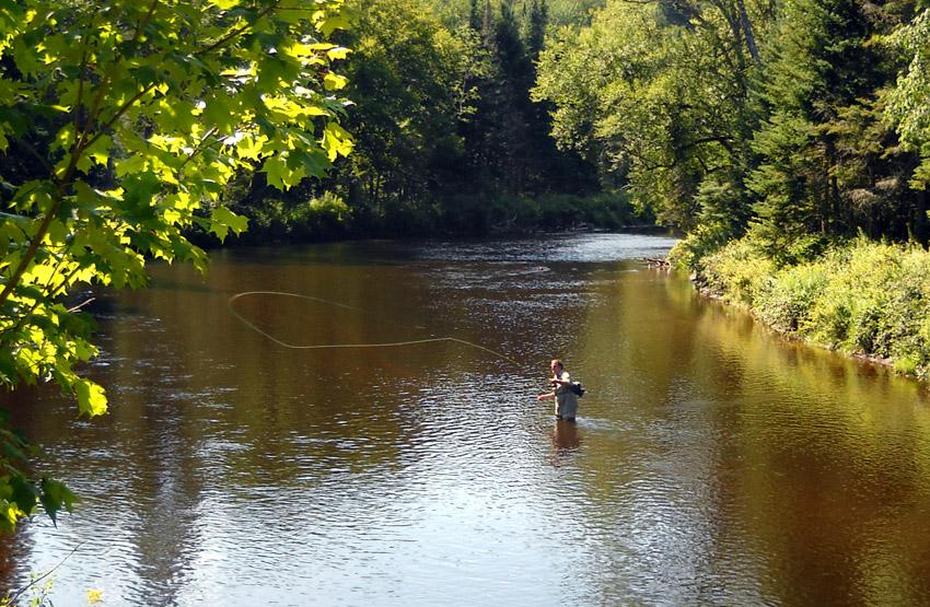 Fishing on the serenity of the Ausable River