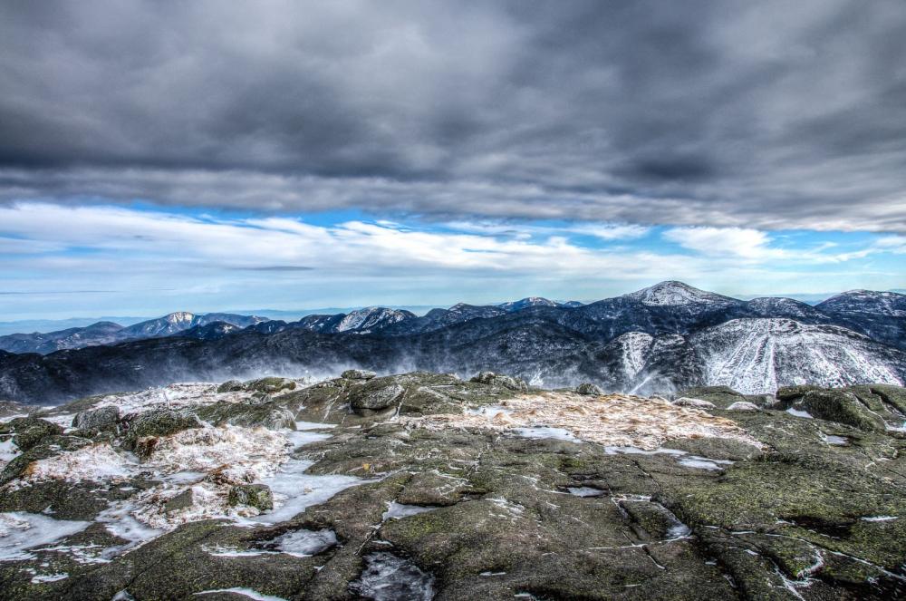 Beautiful and harsh, winter lingers on Algonquin's summit long after the snow has melted elsewhere. Photo by Brendan Wiltse.