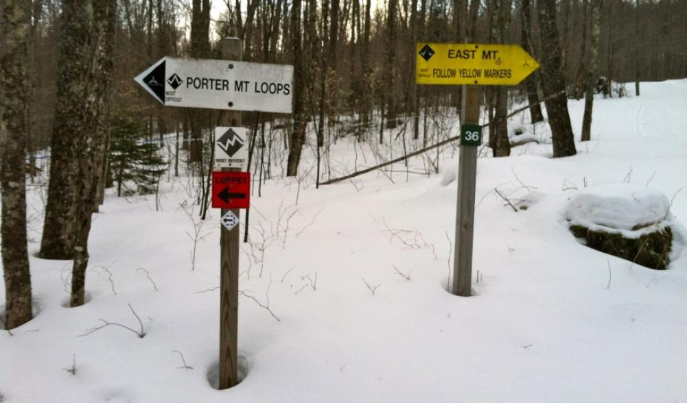 Trail sign indicating the beginning of the Porter Mountain Loops