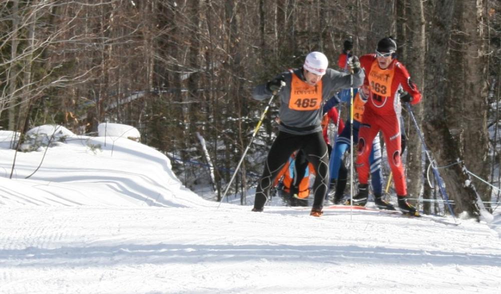 A competitor attacks the final climb on the Porter Mountain Loops during the Lake Placid Loppet