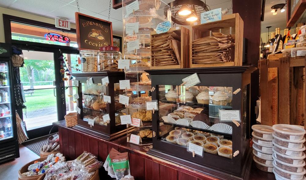 The interior of Cedar Run Bakery and Market with shelves and hundreds of products, including fresh baked goods.