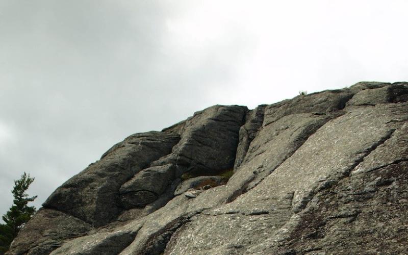 Bear Den Mountain has a rocky bluff.