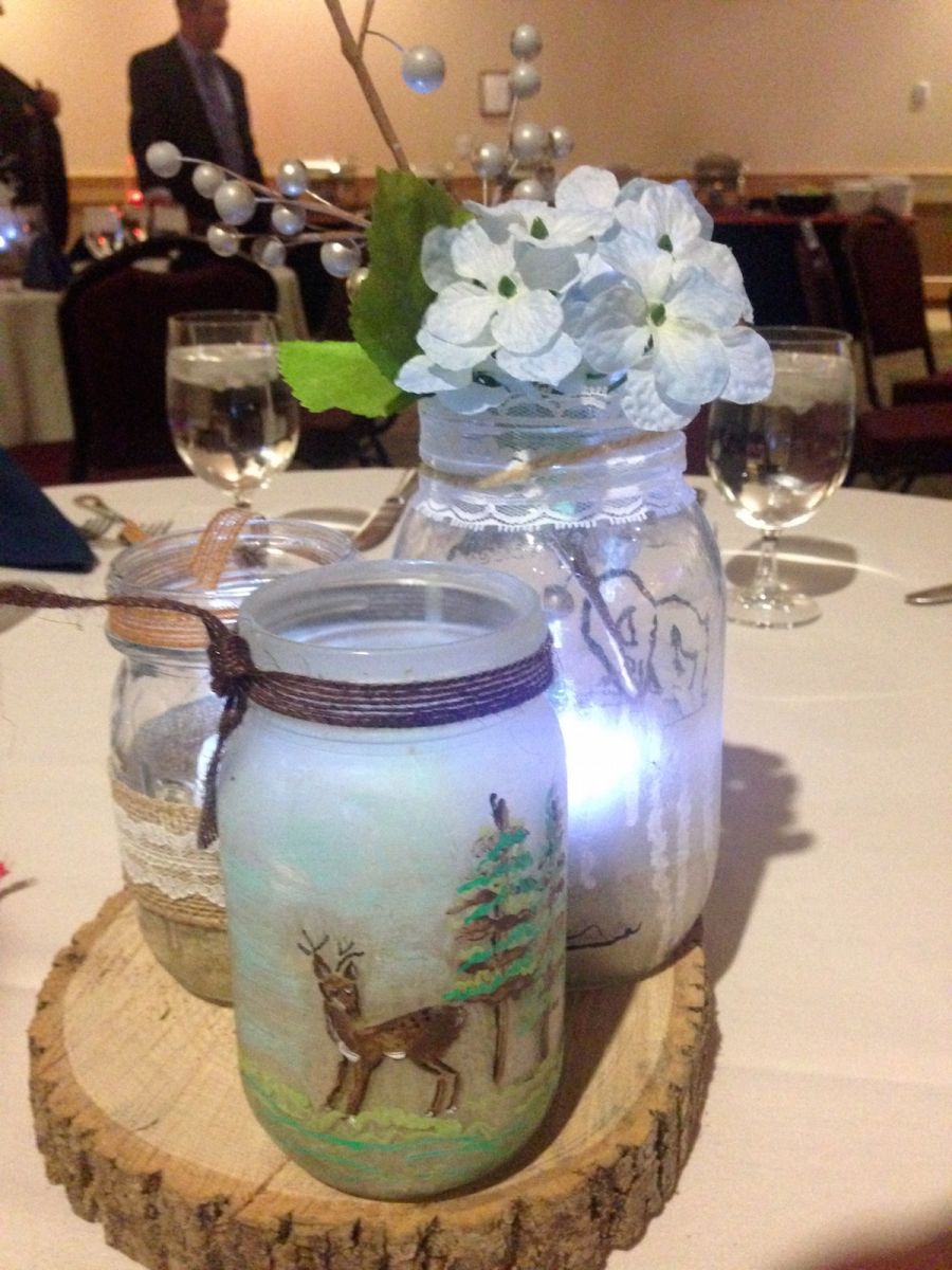 Homemade Adirondack style centerpieces on every table