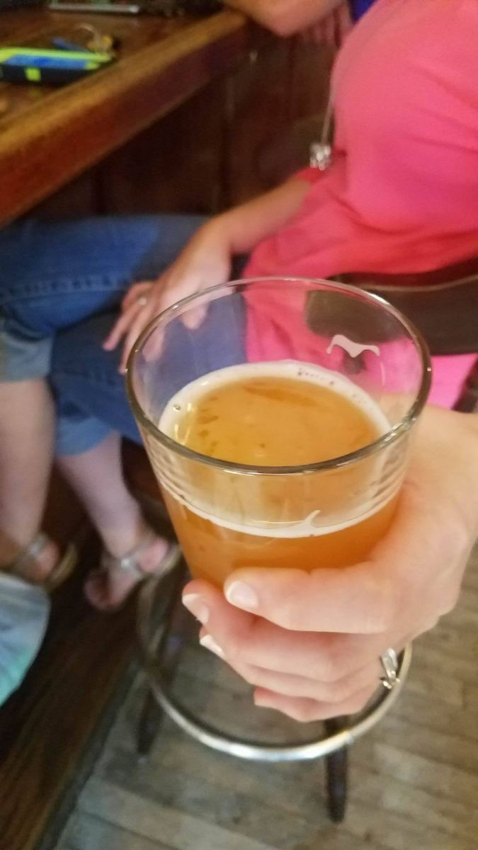 My friend Mary holds my Hefeweizen so I can snag a picture!