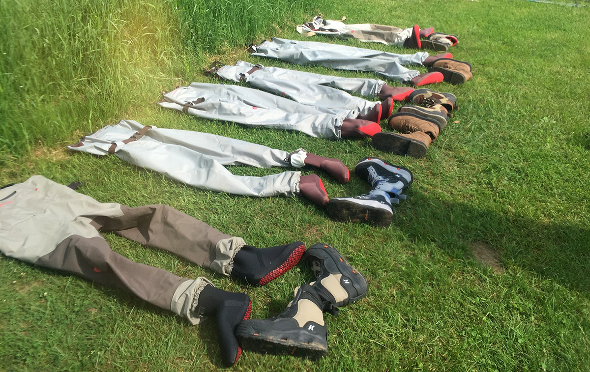 Empty waders and boots await riverwalkers.