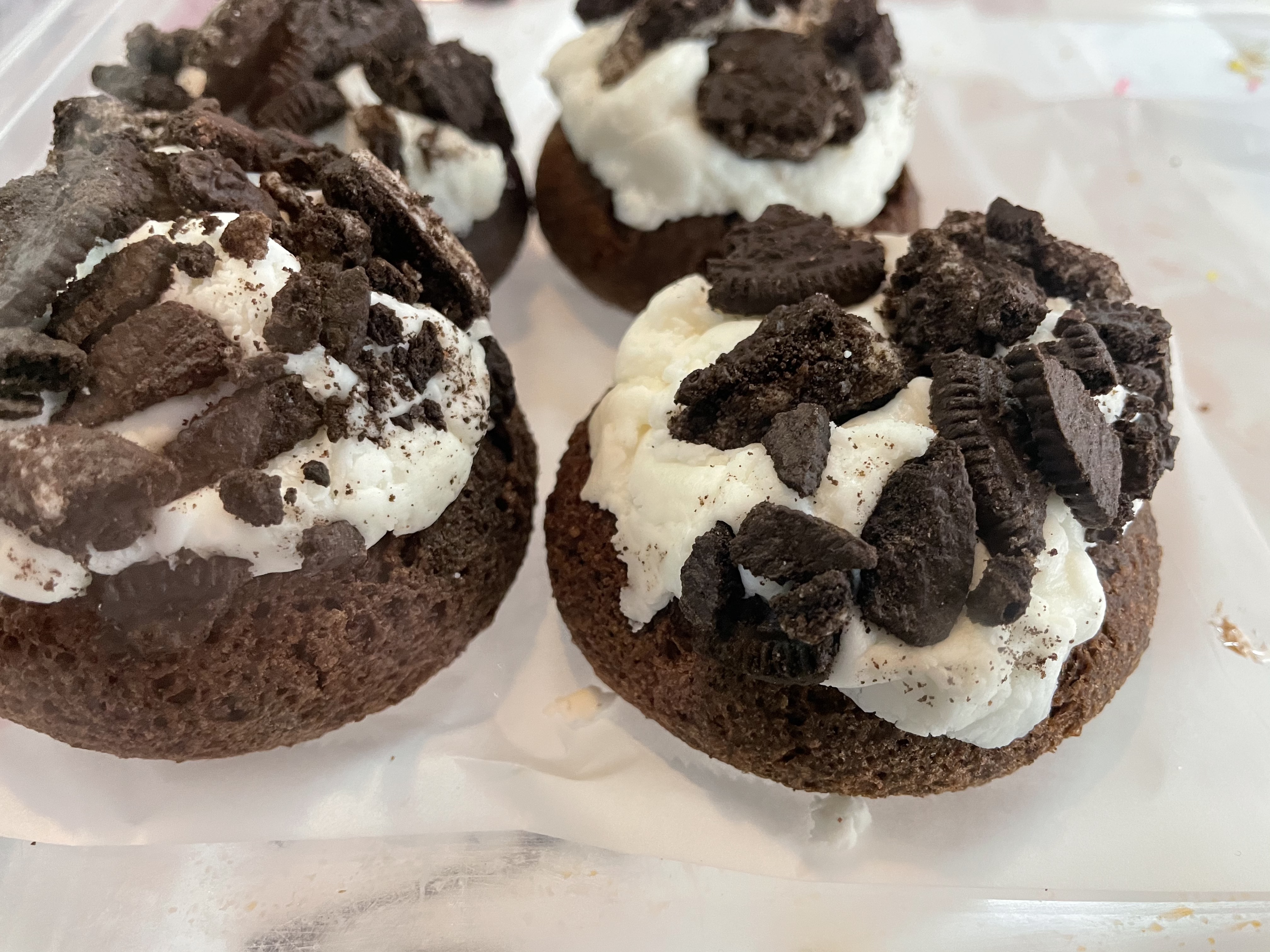 A close-up of cookies and cream donuts.