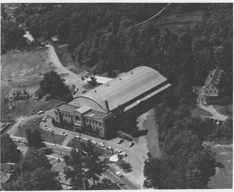 A black and white aerial view of the 1932 Olympic arena&#44; circa 1950. Image courtesy Lake Placid Public Library.