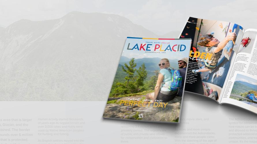 A stack of guides with images of hikers and rock climbers on them.