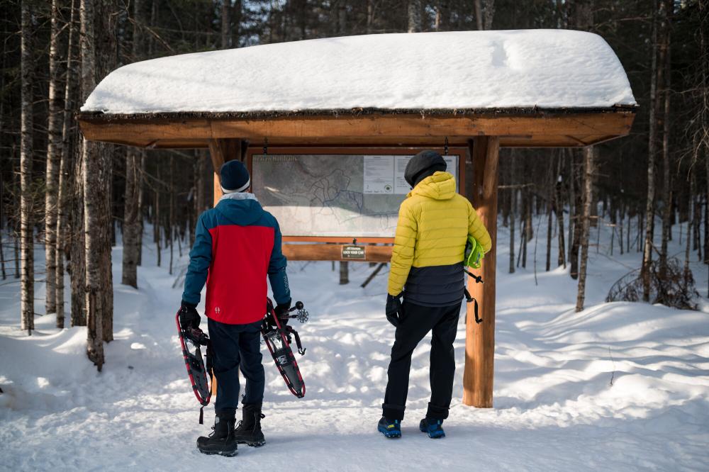 Reading the trailhead before heading out to the trails