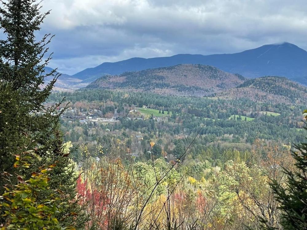 a view of past peak fall foliage in Lake Placid