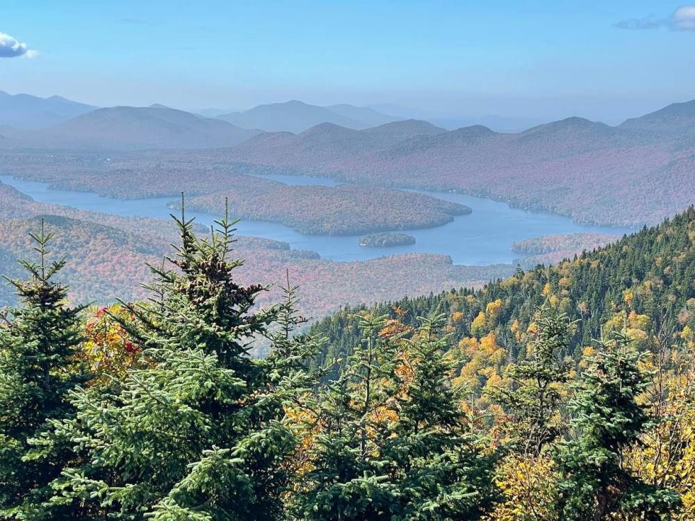 A landscape view of peak fall foliage in the Lake Placid region