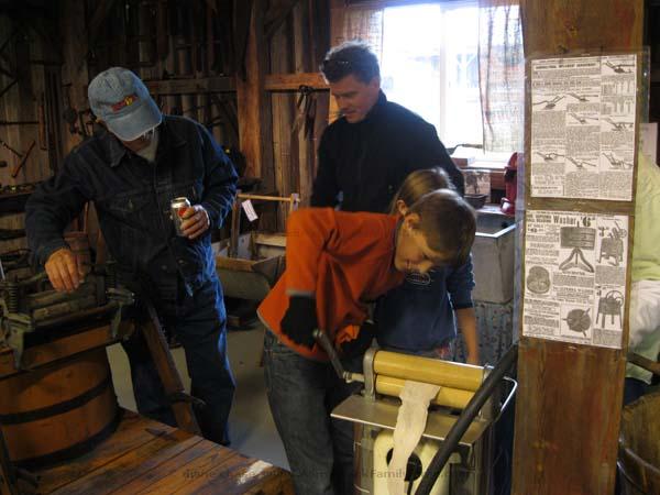 children learn about old fashion tools at Babbie Museum Babbie Museum tools