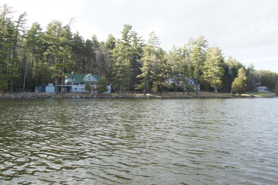 A DEC camp sits on the shoreline of Lake Colby near the public boat launch. DEC camp Lake Colby