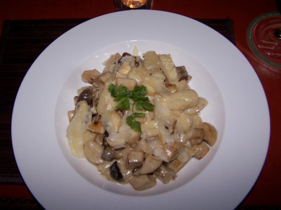 Gnocchi with garden vegetables and pesto cream sauce