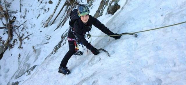 Girl Ice Climbing