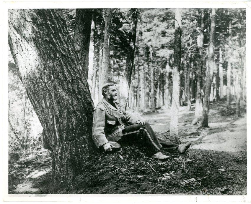 Van Hoevenberg at base of tree c. 1900-1905
