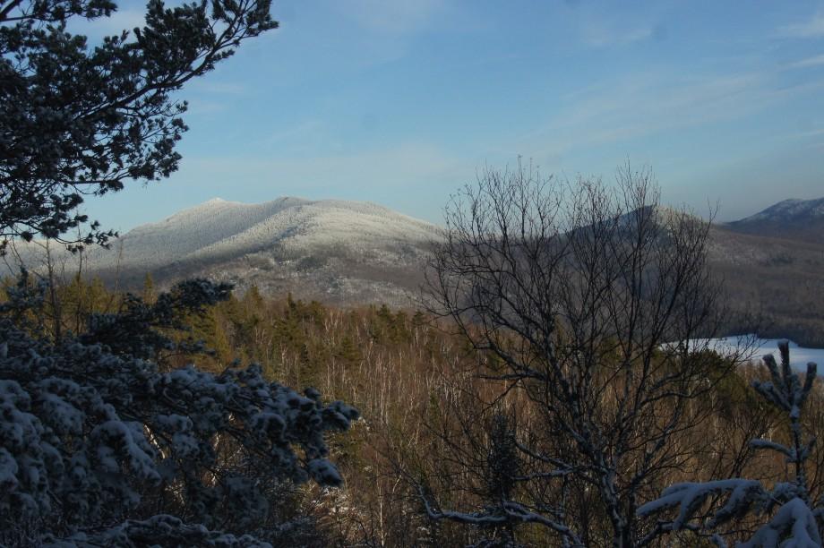 While there are many trees on the top of Baker, there are still nice views of both McKenzie and Haystack Mountains as well as views of the High Peaks. McKenzie Mountain