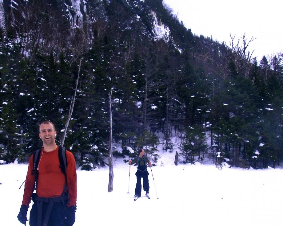 A satisfied skier reaches Avalanche Lake