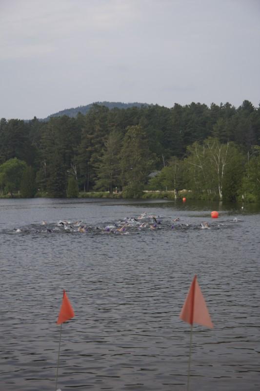 Swimmers make their way to the turnaround buoy