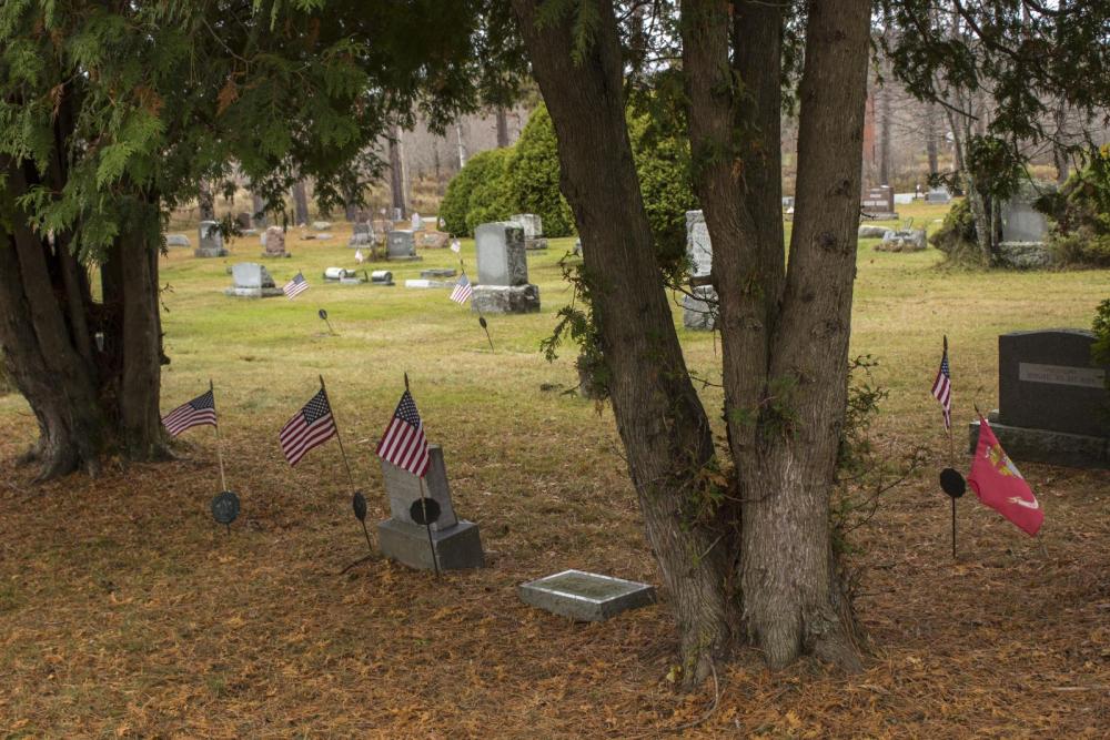 The North Elba Cemetery is filled with veterans flags