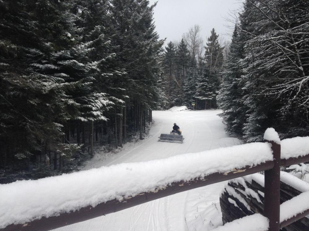 Groomers at work from bridge Groomers at work from bridge