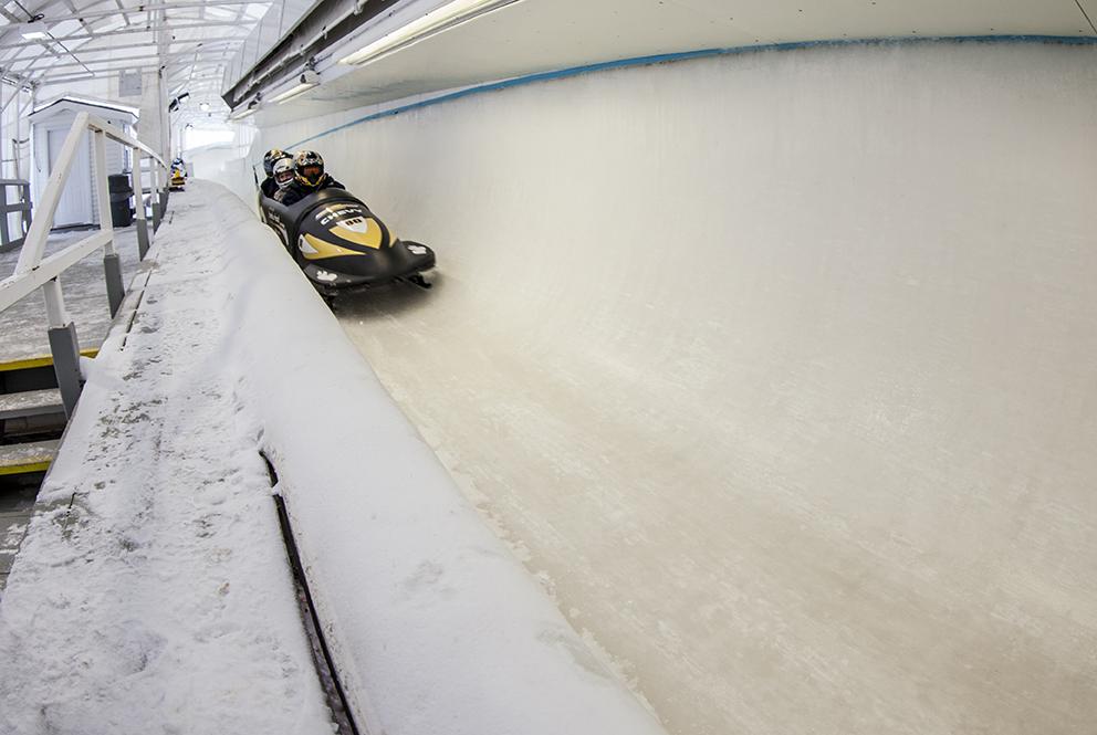 Bobsled passenger ride coming down the track