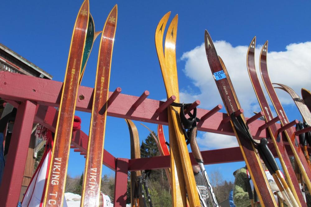 Classic wooden skis lined up at Cascade Ski Center's Wood 'n' Ski Rendezvous