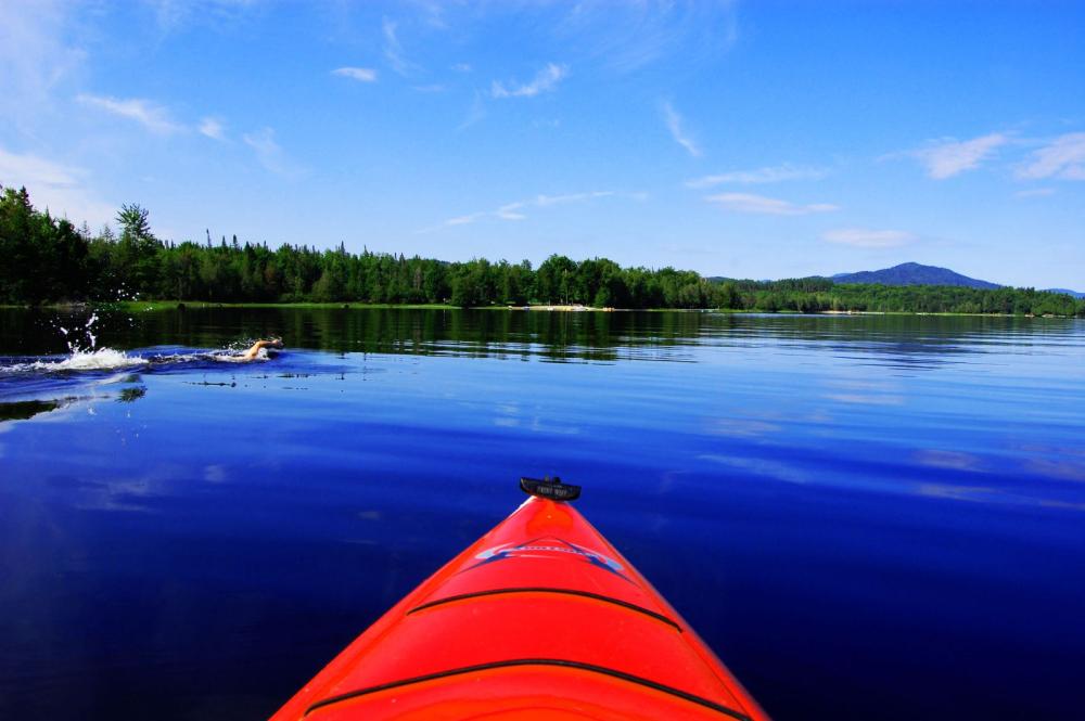 Kayaking and swimming on Lake Harris.