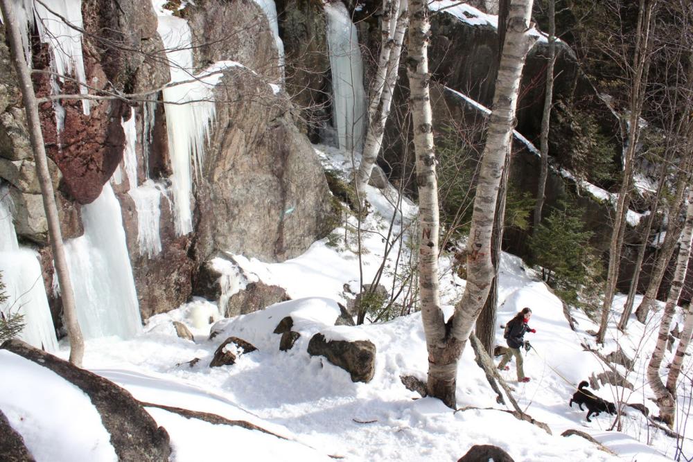 Anna and Belle descend Mount Jo via the long trail, one of the best Adirondack winter hikes.