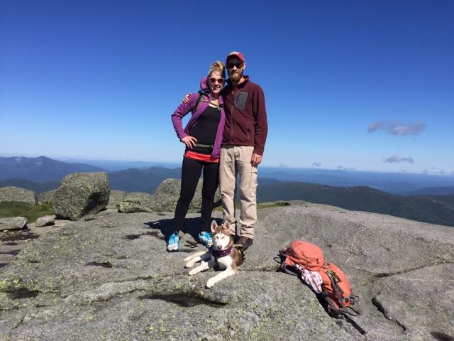 Proud parents at the summit of Algonquin Mountain with Shoka.