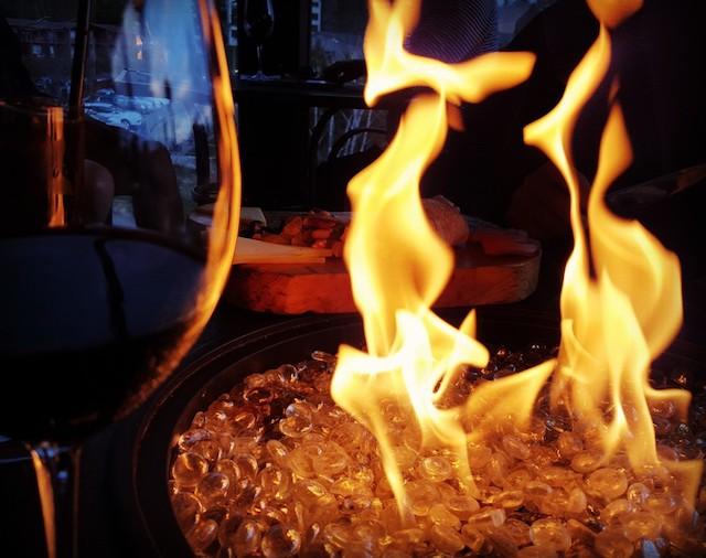 The joys of a chilly night, a firepit, and a fine beverage is part of an Adirondack fall experience. The joys of a chilly night, a firepit, and a fine beverage is part of an Adirondack fall experience.