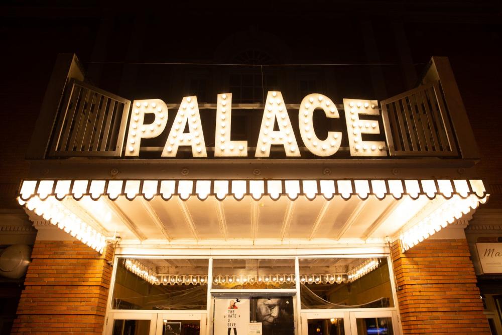 Nighttime view of the entrance of Palace Theater, Lake Placid's movie theater