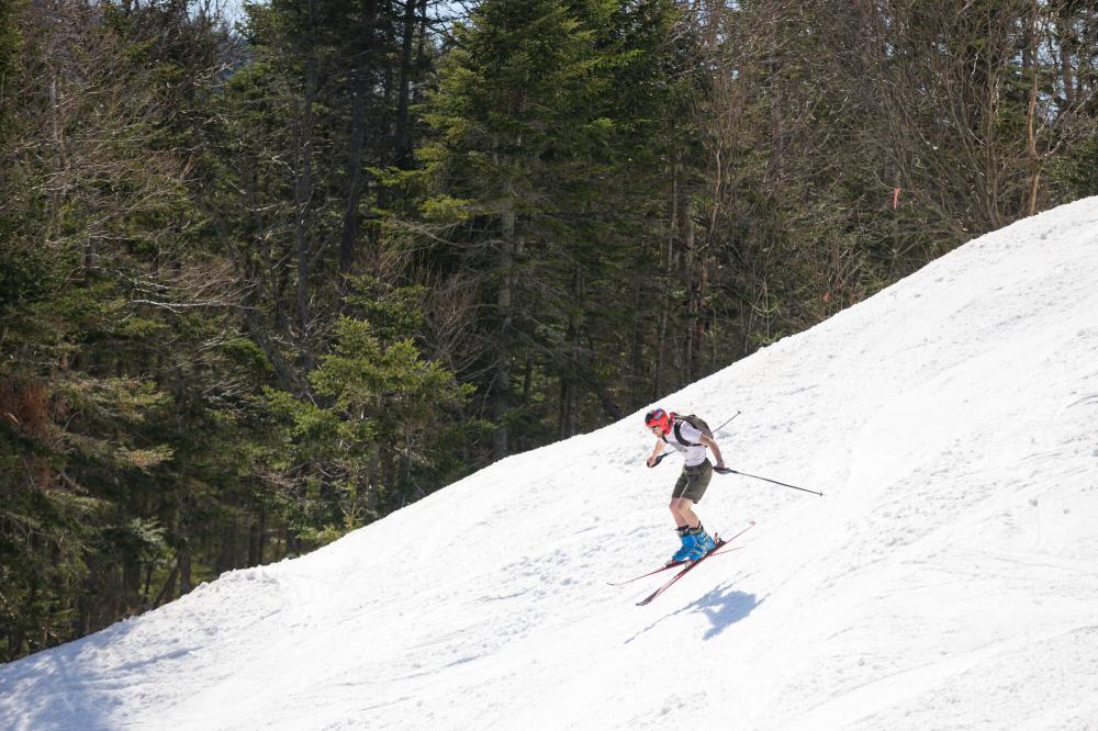 Skiier in shorts skiing at Whiteface Mountain