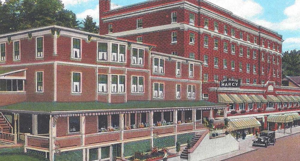 A vintage postcard illustration of the Hotel Marcy in Lake Placid.