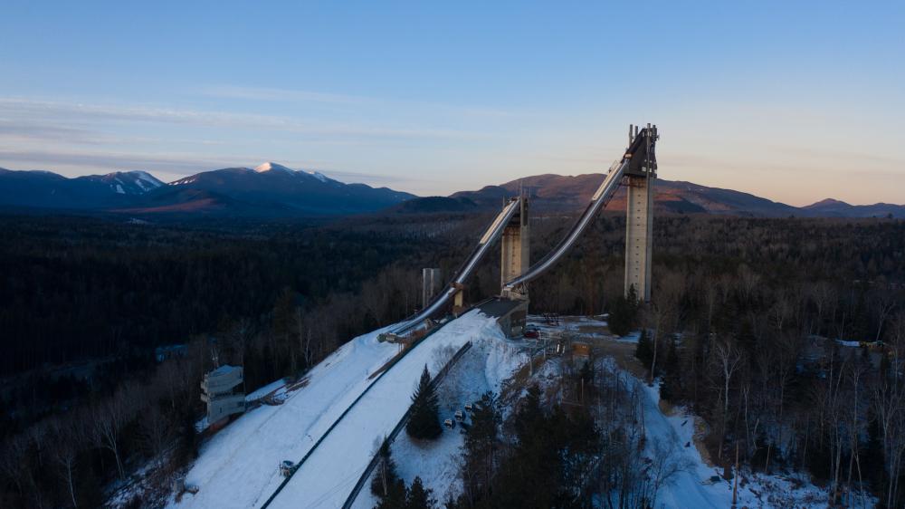 An aerial view of the Olympic Jumping Complex at sunrise.