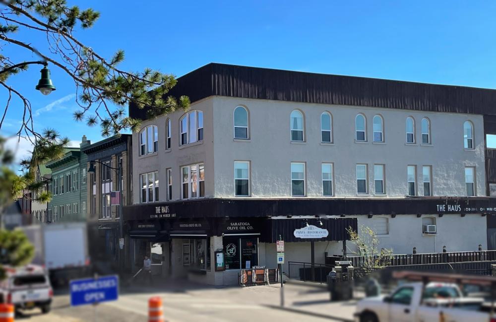 Exterior photo of the Merriam building on Lake Placid's Main Street.