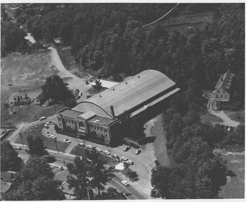 A black and white aerial view of the 1932 Olympic arena, circa 1950. Image courtesy Lake Placid Public Library.