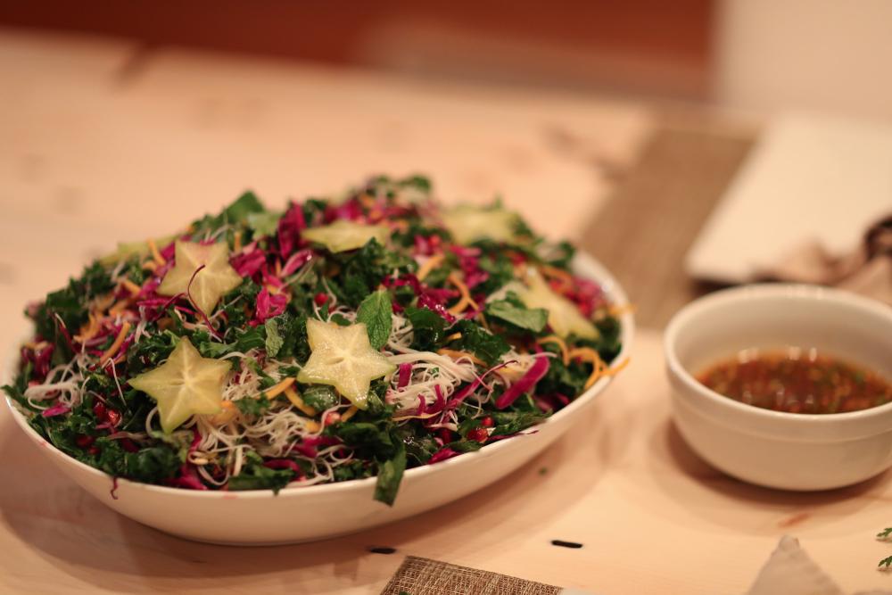 A vegan salad with star shaped vegetables.