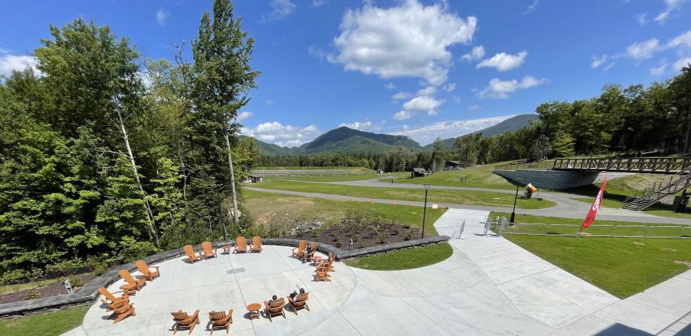 Relax in a circle of Adirondack Chairs outside with High Peak views.