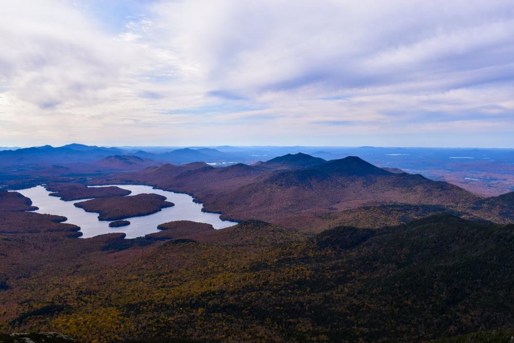 A mountain view with Lake Placid's iconic horseshoe shape below.