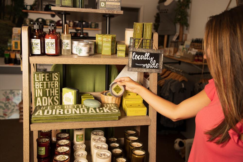 A woman shops for locally made Adirondack products