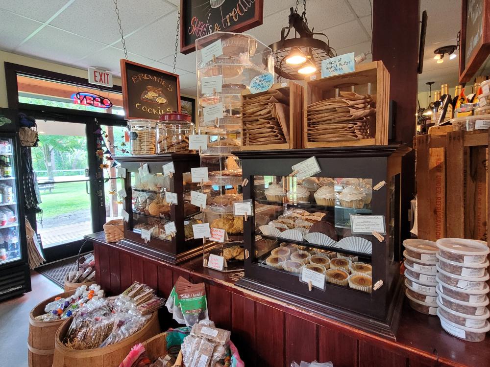 The interior of Cedar Run Bakery and Market with shelves and hundreds of products, including fresh baked goods.