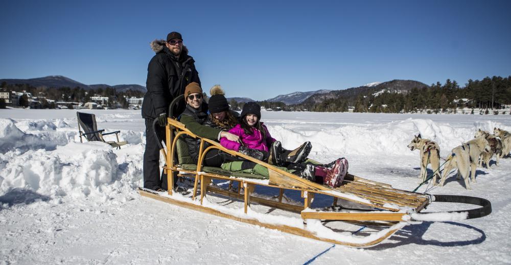 Dog sled ride with a family