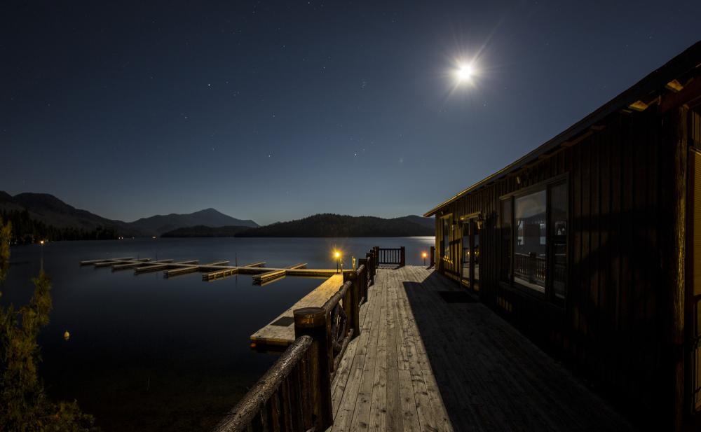 Whiteface Club dock on the water during a full moon.