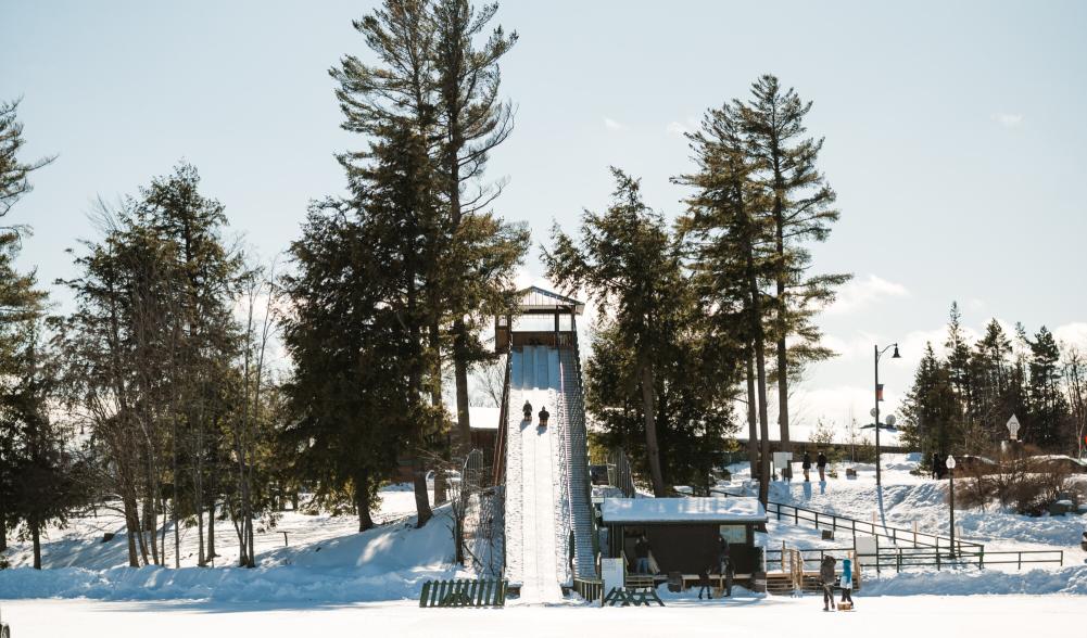 A view of the Lake Placid toboggan chute from frozen Mirror Lake