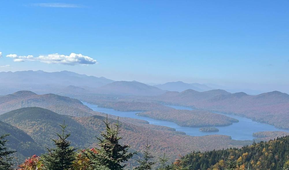 An aerial view of peak fall foliage change in the Lake Placid area