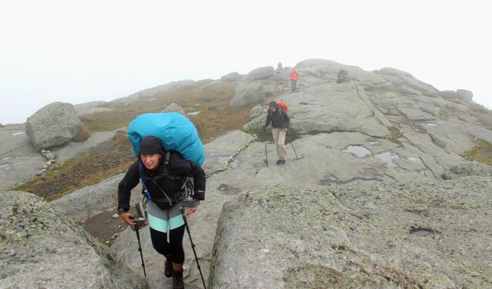 Summer on a High Peak summit can mean pants and windbreakers. Be prepared!