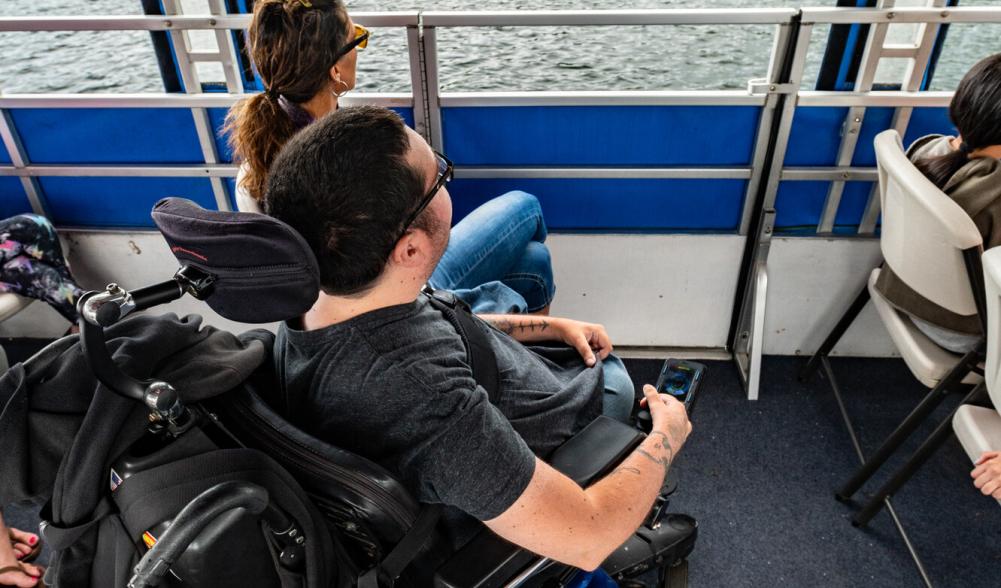 Cory Lee enjoying a boat tour of Lake Placid